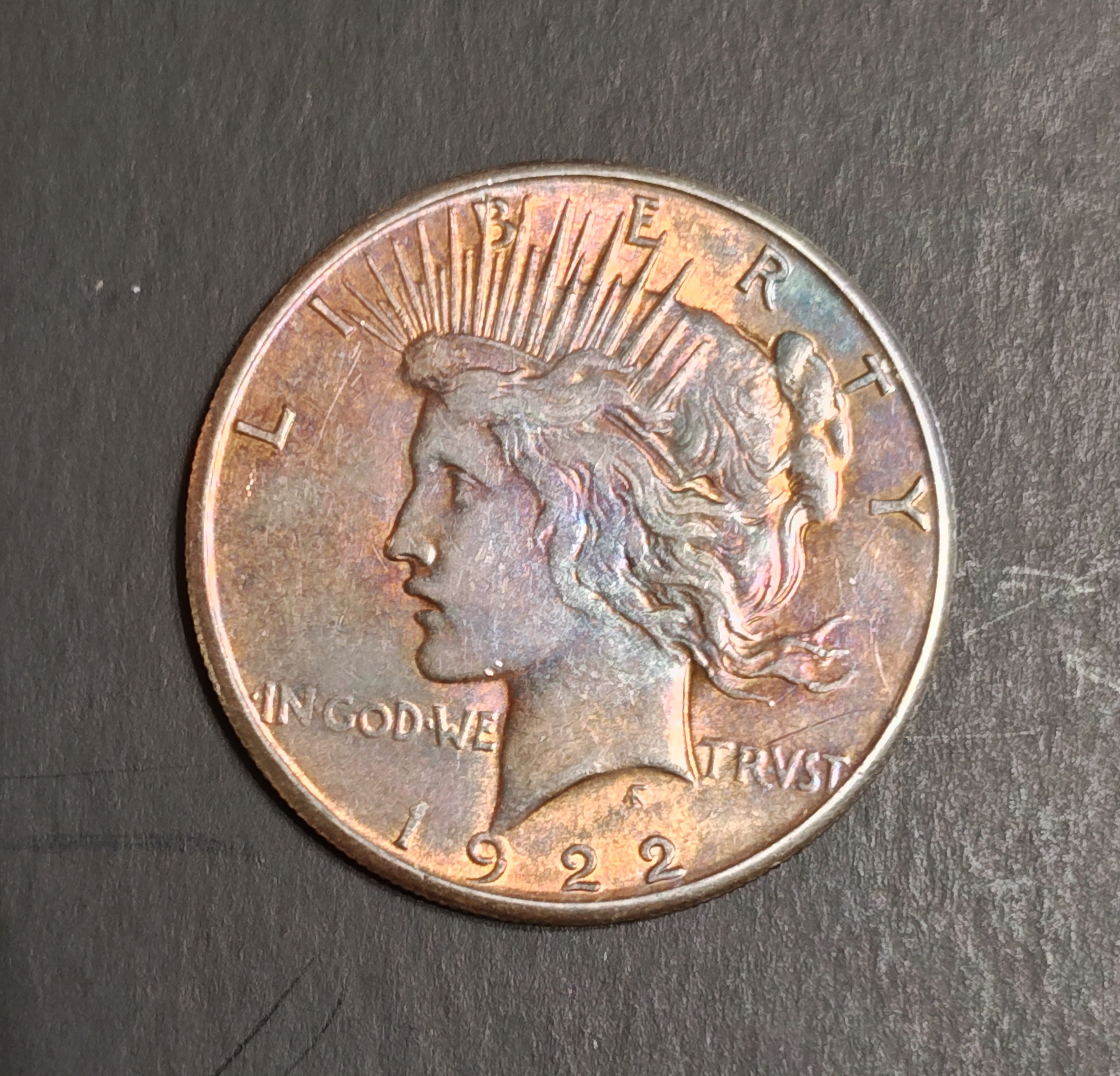 1922 Peace Silver Dollar – Brilliant Rainbow Toned