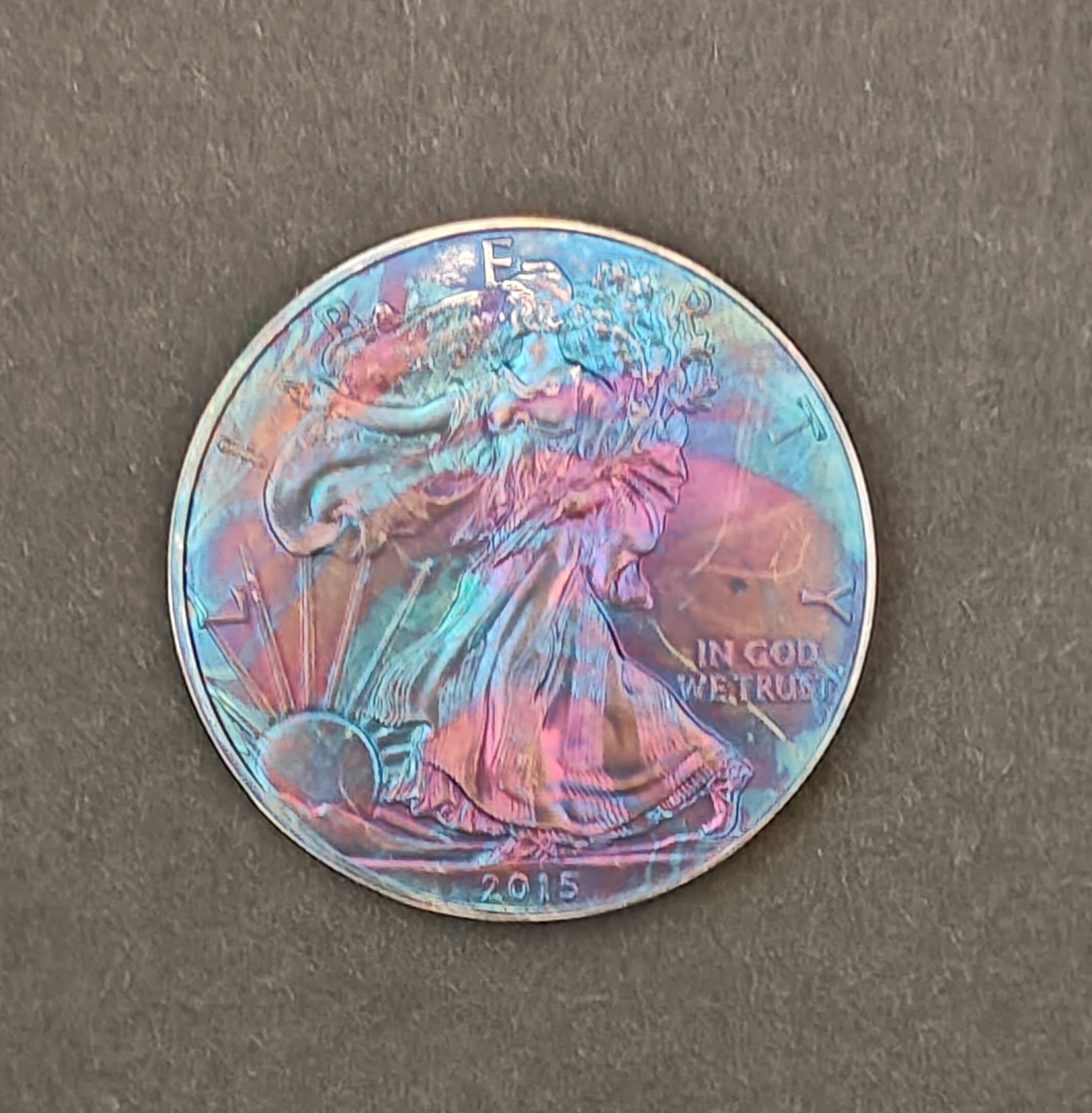 2015 American Silver Eagle – Rainbow Toned 1 oz .999 Fine Silver Coin (Uncirculated, Toned)