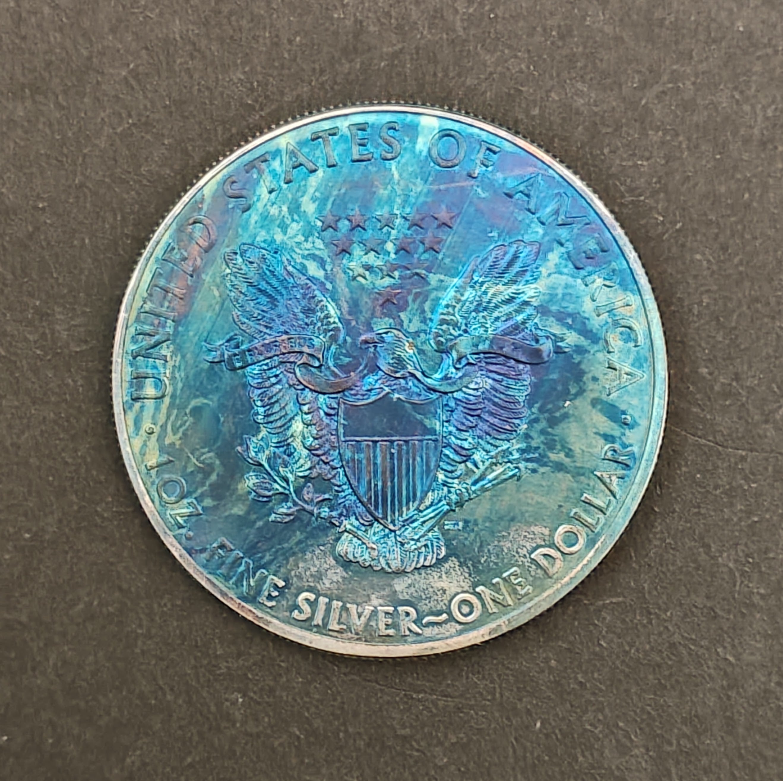 2015 American Silver Eagle – Rainbow Toned 1 oz .999 Fine Silver Coin (Uncirculated, Toned)